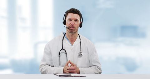 Doctor Providing Online Consultation from Medical Office