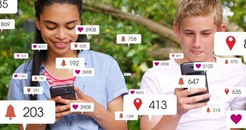 Teens scrolling smartphones in park surrounded by social media notification bubbles