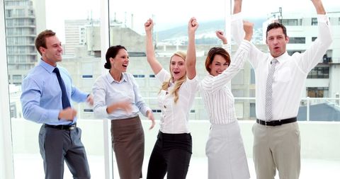 Energetic Business Team Celebrating in Office - Download Free Stock Images Pikwizard.com