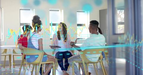 Facilitator leading youth group discussing ideas in collaborative circle with data overlay