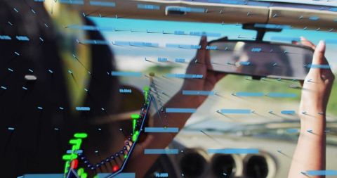 Woman in Aviator Cockpit Using Augmented Reality Signage