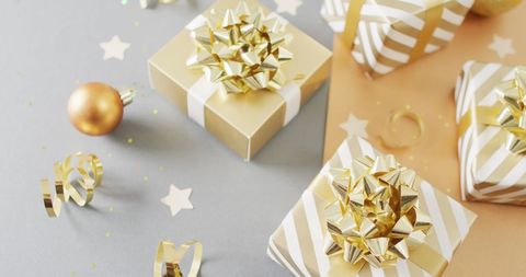 Elegant Christmas Gifts Arrangement with Golden Decorations - Download Free Stock Images Pikwizard.com