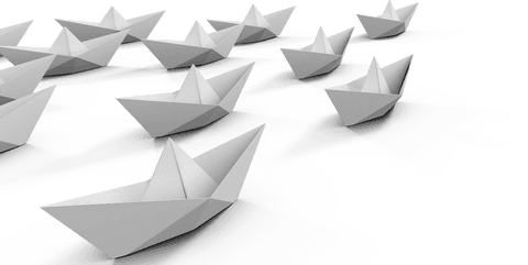 Transparent paper boats formation on white background