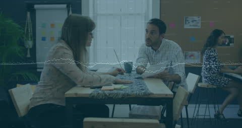 Diverse Coworkers Discussing Data Analysis Scope