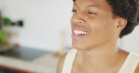 African American Man Enjoying Healthy Green Smoothie at Home