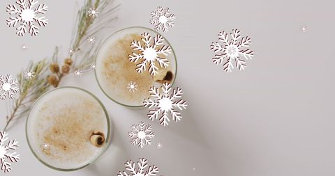 Festive Holiday Drinks with Falling Snowflakes - Download Free Stock Images Pikwizard.com