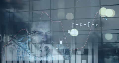 Businessman Analyzing Digital Financial Charts