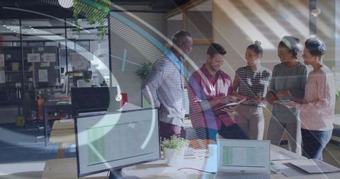 Coworkers Collaborating in Modern Office Open Workspace