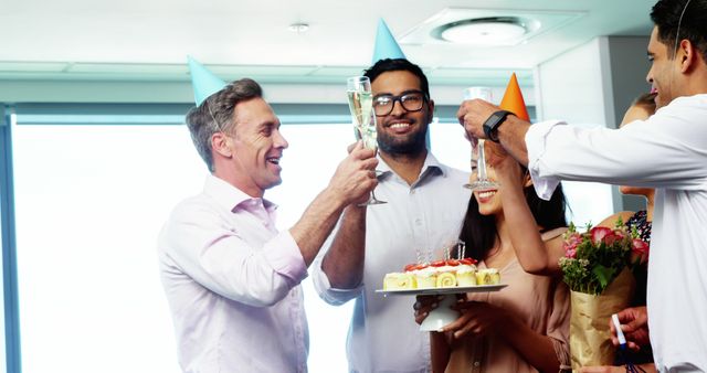 Executives celebrating a colleague birthday in office