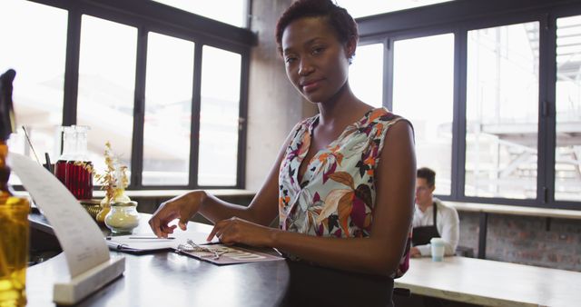 Confident Businesswoman Working in Modern Office Environment - Download Free Stock Images Pikwizard.com