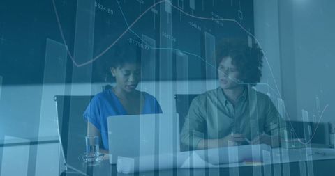 Business meeting with financial data overlay for strategic planning