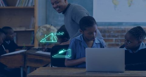 Boys learning geometry with engaged teacher in classroom