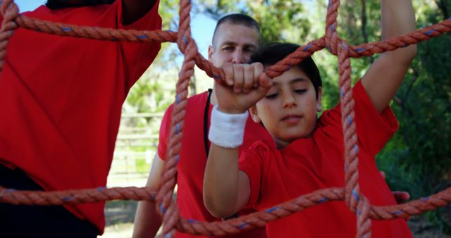 Child Completing Obstacle Course with Teacher Assistance - Download Free Stock Images Pikwizard.com