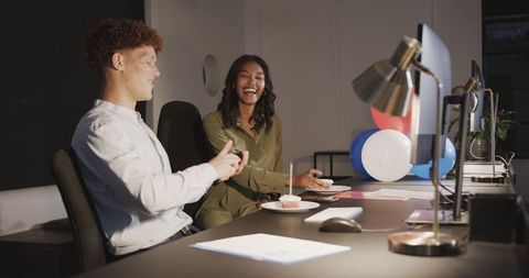 Diverse Colleagues Collaborating at Office Desk, Coffee and Laughter