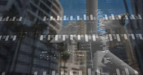 Financial charts overlay modern office interior representing data analytics