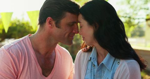 Romantic Couple Sharing Intimate Moment in Sunlit Setting - Download Free Stock Images Pikwizard.com