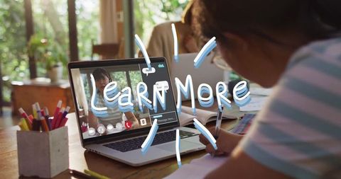 Girl learning online in sunlit room with inspirational message