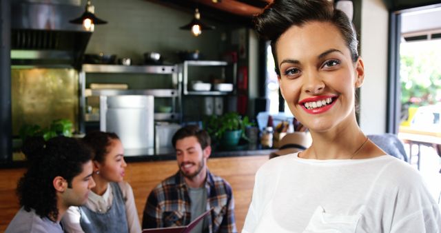 Smiling Woman Waitress with Group of Diverse Friends in Coffee Shop - Download Free Stock Images Pikwizard.com