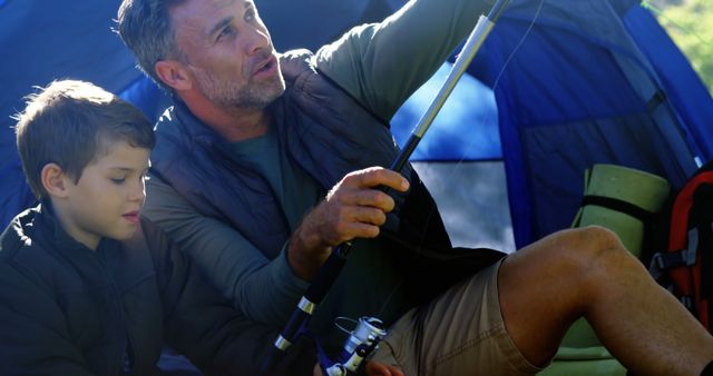 Father and Son Bonding During Camping Fishing Trip in Nature - Download Free Stock Images Pikwizard.com