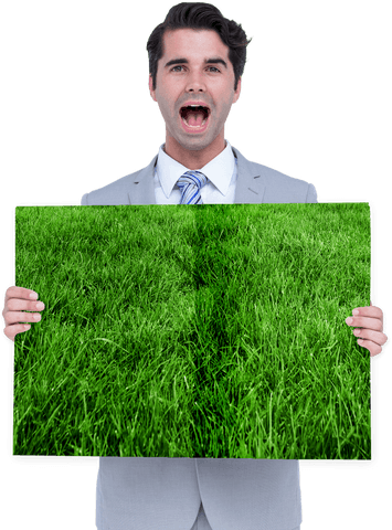 Caucasian businessman excitedly holding grass photo transparent version
