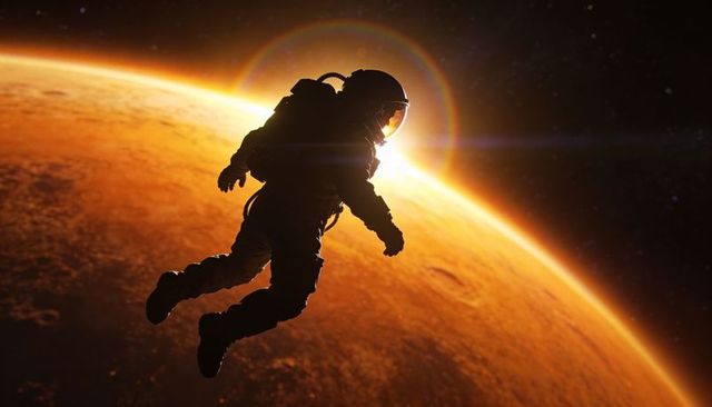 Silhouette astronaut floating above red planet backlit visor lens flare spacewalker