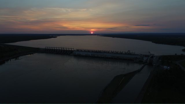 Serene Sunset Over Vast Reservoir and Dam - Download Free Stock Images Pikwizard.com