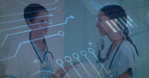 Doctors Collaborating over Digital Health Data Overlay and Clinical Charts in Hospital Corridor