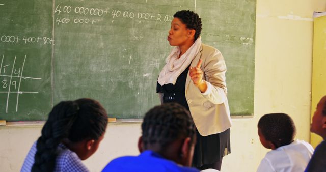 African Female Teacher Leading Math Lesson in Classroom - Download Free Stock Images Pikwizard.com