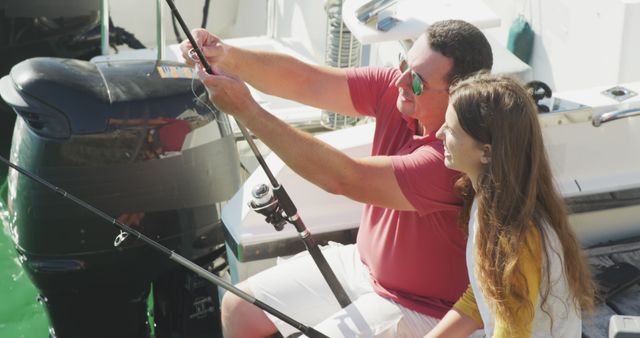 Father and Daughter Enjoying a Fishing Trip on a Boat - Download Free Stock Images Pikwizard.com