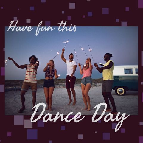 Youthful friends celebrating dance day with sparklers outdoors