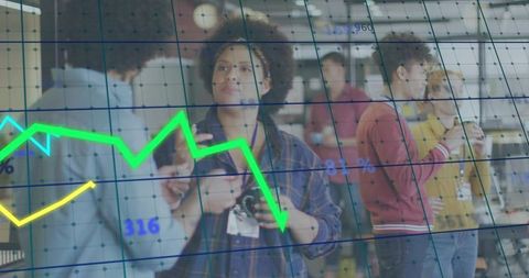 Woman analyzing camera at tech networking conference while digital graphs overlay workspace