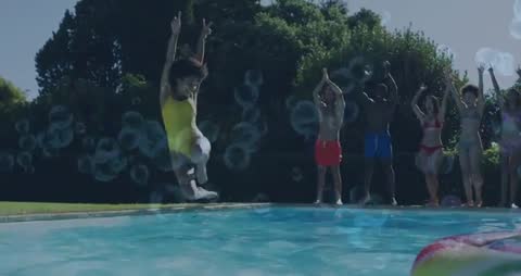 Child Splashes into Pool Surrounded by Cheerful Friends
