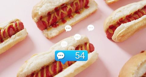 Hotdog social notification concept featuring chat bubble 54 on pastel pink flatlay