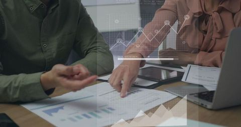 Pointing and reviewing business charts during collaborative data analysis meeting