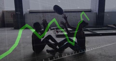 Athletic duo catching medicine ball with rising green data chart overlay