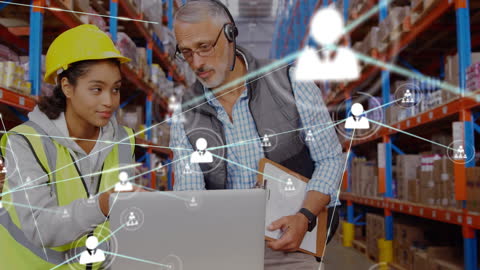 Warehouse Workers Using Technology in Logistics and Networking Concept