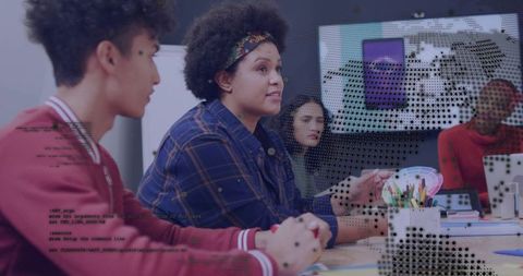 Leader facilitating collaborative workshop with diverse team, brainstorming and design tools