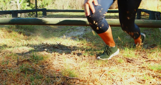 Outdoor Obstacle Course with Athlete Crawling Under Device - Download Free Stock Images Pikwizard.com