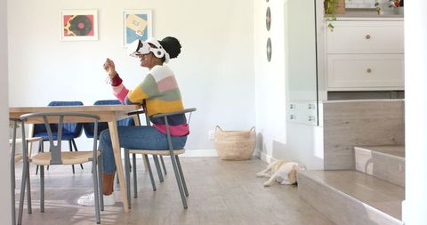 Woman Enjoying Virtual Reality Adventure at Home - Download Free Stock Images Pikwizard.com
