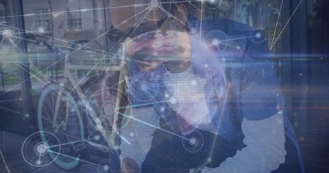 Digital Network Connections Overlaid on Woman with VR Headset