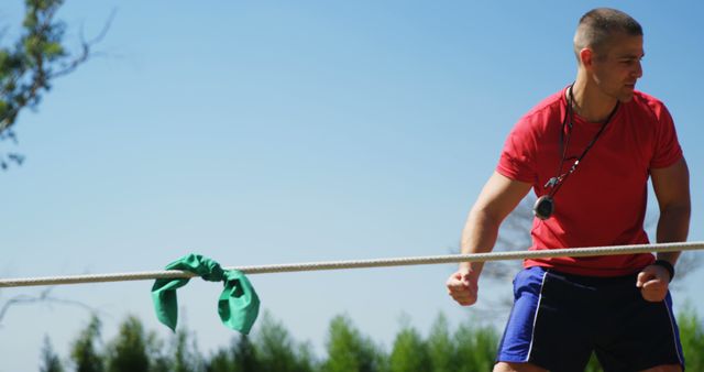 Male Fitness Instructor Training With Resistance Bands Outdoors - Download Free Stock Images Pikwizard.com