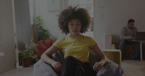 Woman Relaxing on Beanbag Chair Home Atmosphere