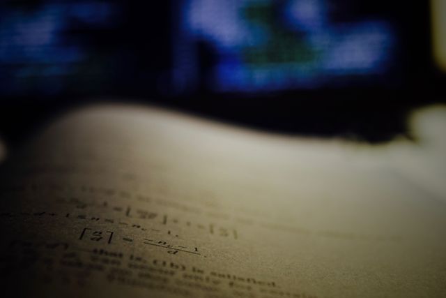 Close-Up of Mathematical Equations on Paper with Blurred Background - Download Free Stock Images Pikwizard.com