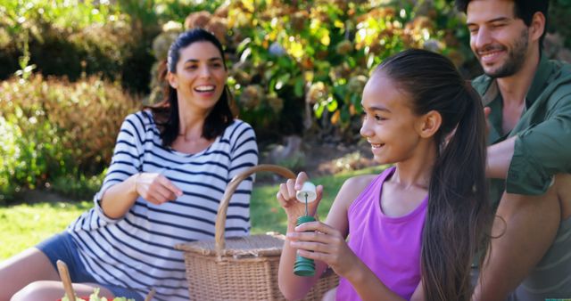 Happy Family Enjoying Picnic Outdoors on Sunny Day - Download Free Stock Images Pikwizard.com