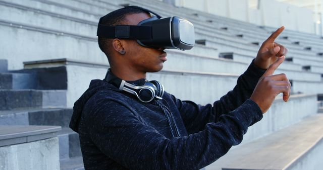 Young Man Using Virtual Reality Headset Outdoors - Download Free Stock Images Pikwizard.com