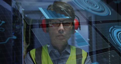Asian Worker Analyzing Data in Server Room with Augmented Interface