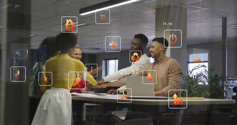 Diverse team collaborating with augmented reality analytics around standing table in modern office
