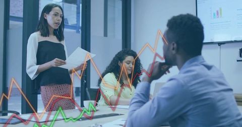 Business Professional Presenting Data in Modern Office Setting