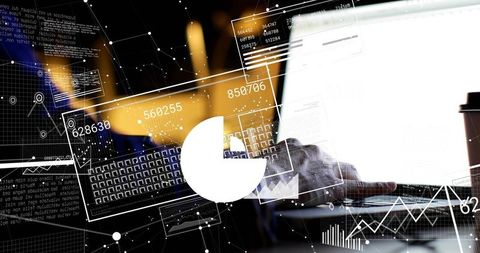 Right hand typing laptop with data visualization overlays analyzing business metrics