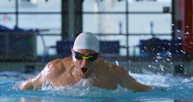 Competitive Swimmer in Pool Expending Energy in Front Crawl Stroke - Download Free Stock Images Pikwizard.com